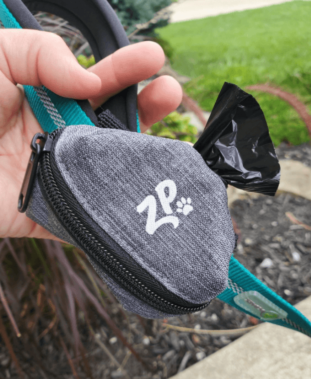 ZippyPaws Dog Poop Bag Holder being tested by our review team.
